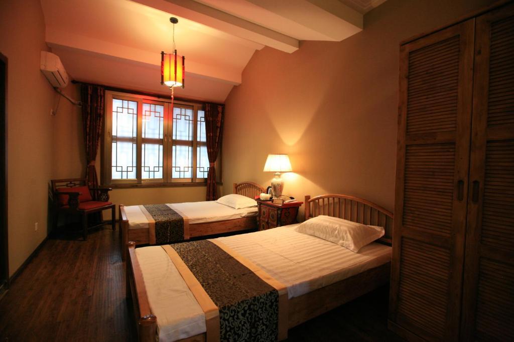 A Pousada Jano'S Backpackers Xi'An Xian Quarto foto
